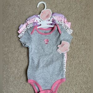 NWT set of 4 onesies size 12 months